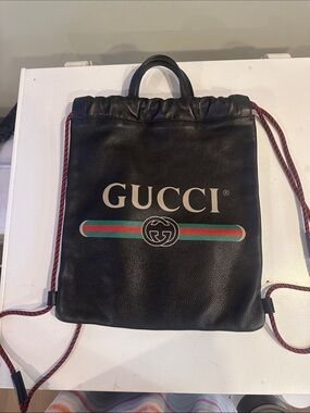 Gucci Black Leather Drawstring Backpack with Signature Web Stripe